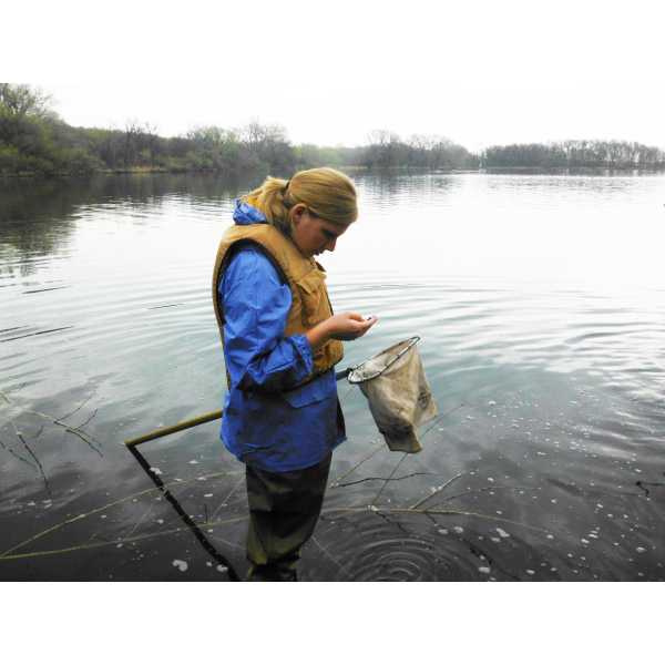Eric Benbow's grad student Courtney Larson works with stream ecology.