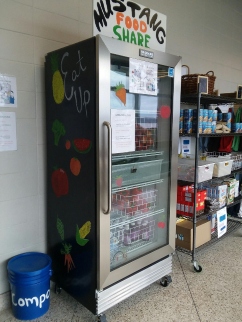 step 3 munising mshs 25_2.jpg A community food sharing refrigerator with a glass door, labeled